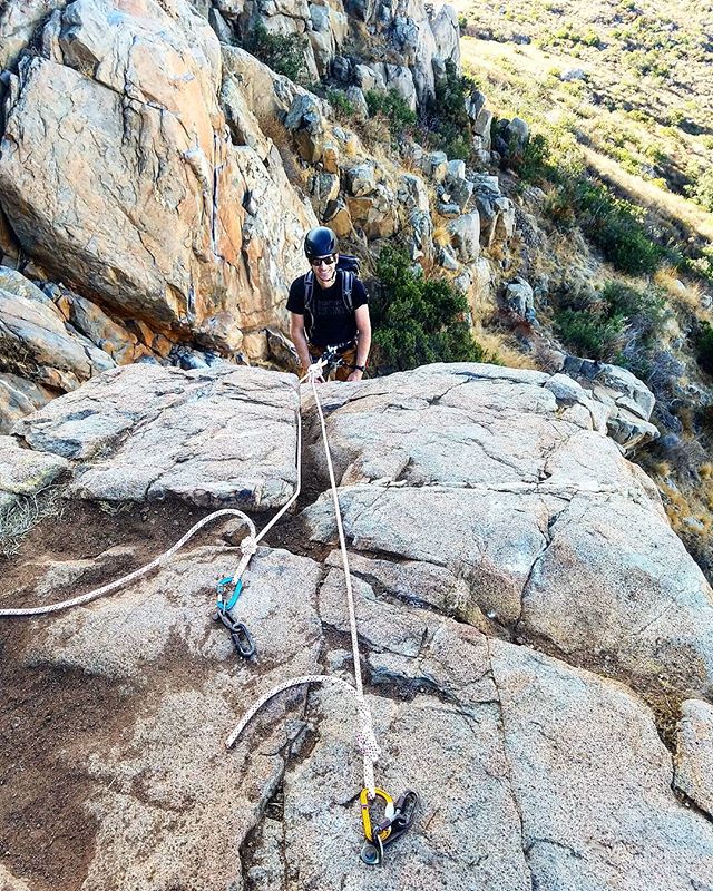 We had so much fun teaching our advanced anchor class last week. In this picture Brad set up a toprope on a bolted anchor. Since the bolts were so far back - away from the edge - our best solution was to use a static rope long enough to bring the masterpoint low and over the edge. Static ropes anywhere from 9mm-11mm are great for this application where a long extension is needed to position the masterpoint low in order to avoid extensive wear on your rope. Once we had the static rope clipped to the bolts we also used a friction on one anchor leg to safely approach the edge and tie the masterpoint in the direction of pull... all that resulted in a nice equalized anchor with a clean running top rope  So much fun to teach these little details that go such a long way in everyones climbing careers. Cheers and stay safe on the rocks.